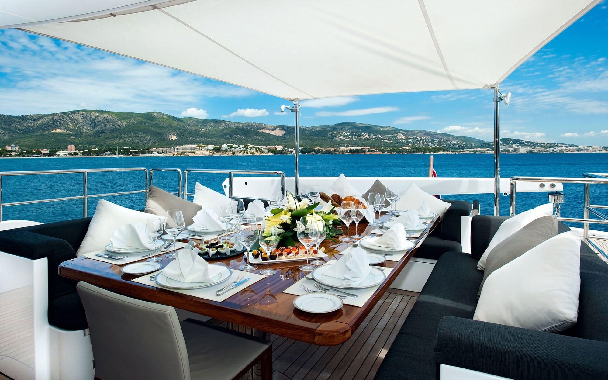 Private dining table on a yacht deck
